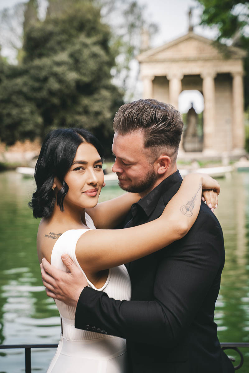 beautyfull man and woman hugging at villa borghese